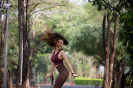 Asian woman is warm up, To make the muscles flexible Before going to jogging for good health and energy
metabolism,Outdoors cross training workout. Healthcare conceptの写真素材