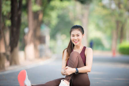 Asian woman is warm up, To make the muscles flexible Before going to jogging for good health and energy
metabolism,Outdoors cross training workout. Healthcare conceptの写真素材