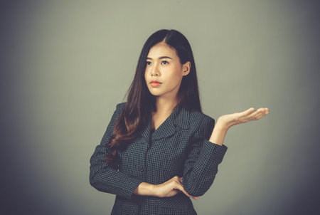 Portrait of Asian woman, happy working day.beautiful modern businesswoman ,holding tablet computer...
