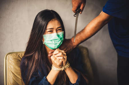 Trafficked human traffickers. Women violence. Abused and tortured concept. Human trafficking concept. Stop violence against Women. International women's Day. Stop abusing violence. selected focusの写真素材