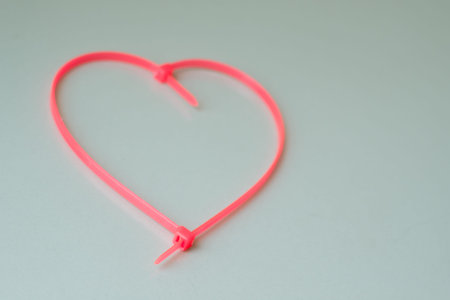 Cable Tie pink heart-shaped  color in dim light .