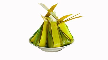 Dessert wrapped in banana leaf with Thailandの写真素材