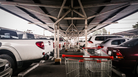 Cart in parking lot Adjust the image darker tone.の写真素材