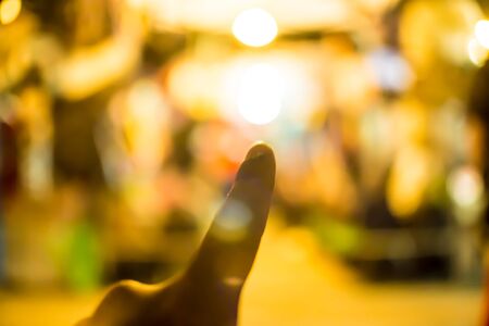 Blurred Background bokeh Fingers and lights.の写真素材