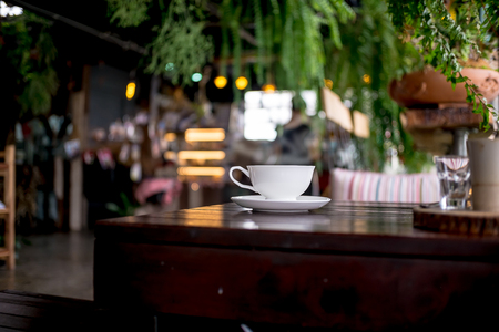 Coffee cup and tea On a wooden table in coffee shop - LOFT styleの写真素材