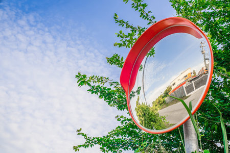 Reflection of road in the traffic safety mirror.の写真素材