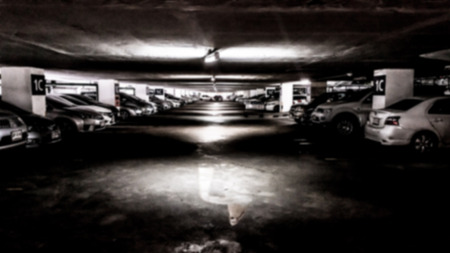 Blurred Background Parking lot at the mall with street light at night .の写真素材