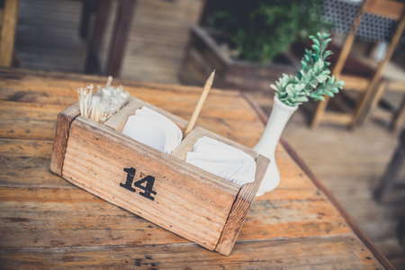 The Tissue and Order paper On a wooden table .の写真素材