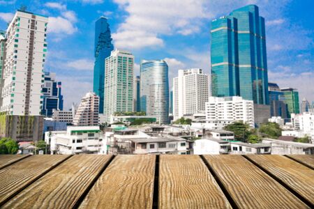 Empty Old Wooden table with city background .の写真素材