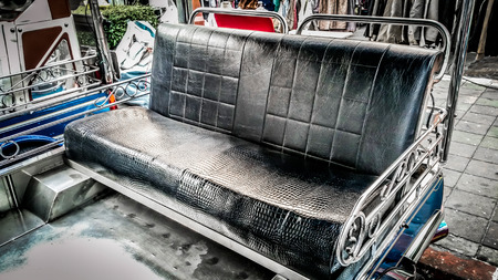Bangkok street transport , traditional asian Car Seats tuk tuk shape rickshaw 3-wheeler taxiの写真素材