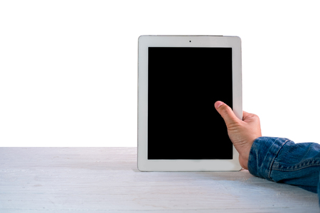 Attractive Modern business woman Hand Touching and Using Digital tablet Screen . Analyst Department Researching Process . Young Girl Working New Startup . isolated on white background . mockupの写真素材