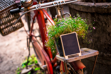 vintage Wooden board sign page on bicycles . Stand tent card Used for Menu Bar and restaurant or put everything into it . mockupの写真素材