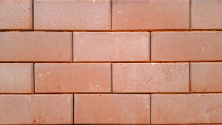 Brickwork or cement brick wall backgroundの写真素材