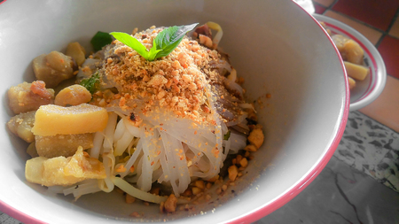 Tom yum dry noodles no soup and Pork meatballs Recommended top dishes menu in Thailand . spicy thai foodの写真素材