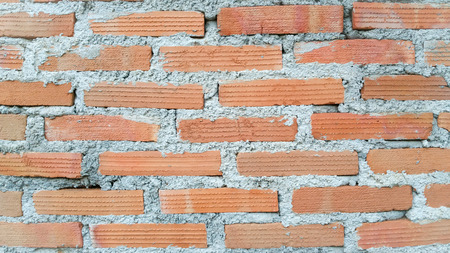 Brickwork or cement brick wall backgroundの写真素材