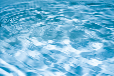 Water wave transparent surface in swimming pool. water Blue Background.の写真素材