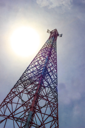 Mobile phone tower in cloudy day. Mobile phone tower in cloudy day.