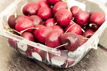close up of cherry  in a plastic box.の写真素材