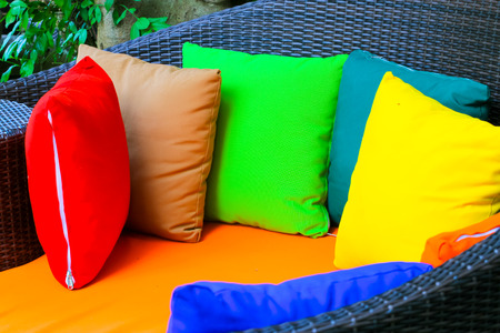 pillow colors on chair, colorful pillow on chair decoration exteriorの写真素材