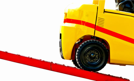 Forklift  on loading dock close up  isolated on white background