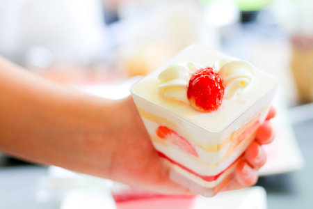 dessert in handの写真素材