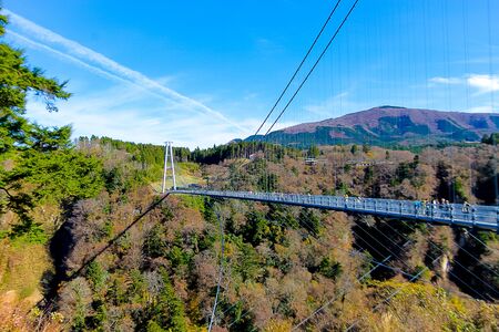 kokonoe "Yume" Grand Suspension Bridge Oita,Japan,  bridge float over the forested valley below, constructed at an impressive 777 meters off the ground. It is 390 meters long to cross from one side to the other, and takes on average twenty minutes to crosの写真素材