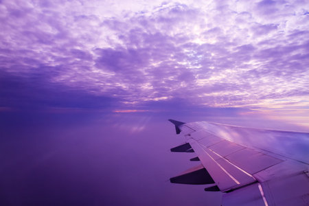aircraft wing under the amazing cloud