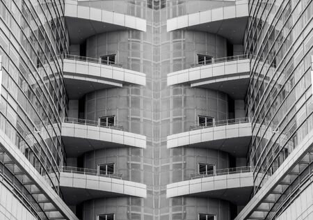 architecture with window building pattern for background with fragment of modern architecture, walls made of glass and concrete.の写真素材