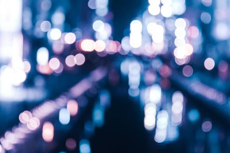 Night city lights bokeh background,Abstract bokeh background,bokeh circles for Christmas card. Defocused.の写真素材