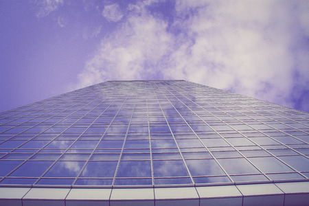 architecture with window building pattern with the reflection of sky for background .の写真素材