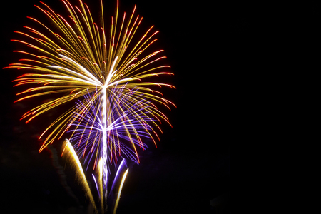 fireworks on the black sky background with reflection on water at Suanluang RAMA IX  THAILANDの写真素材