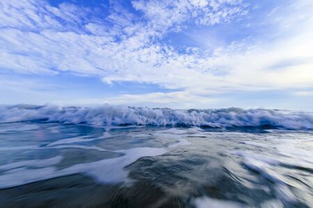 wave on the sea near beach for natural backgroundの写真素材