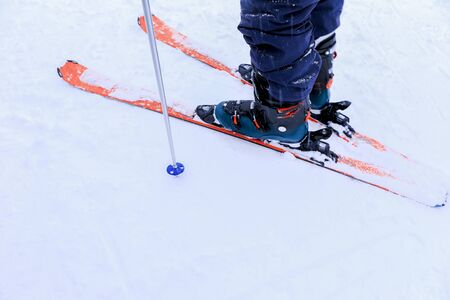 Close up legs of skier foot Legs of a skier freerider close up stand on snowの写真素材