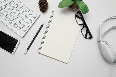 Top view Business desk, marketing and lifestyle white backgroundの写真素材