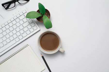 Top view Business desk, marketing and lifestyle white backgroundの写真素材