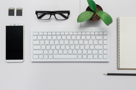 Top view Business desk, marketing and lifestyle white backgroundの写真素材