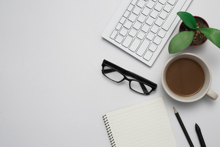 Top view Business desk, marketing and lifestyle white backgroundの写真素材