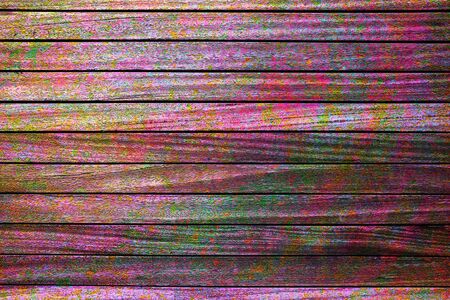 violet and purple,multicolor, wooden wall background, with rustic, grungnge, rough, texture, of colorfull raster image.の写真素材