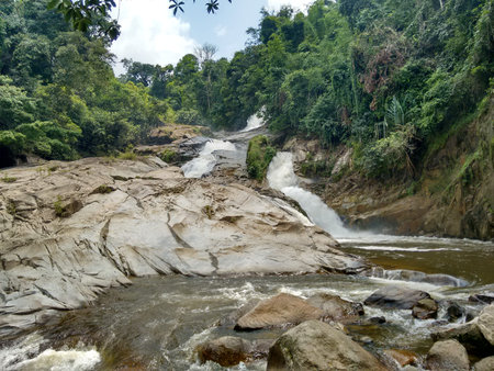 Flowing water and rocksの写真素材