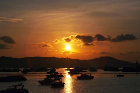 sunrise at Chalong bay, Phuket thailandの写真素材