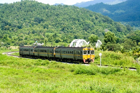 Diesel rain car go to chiangmai province, photo at Lampoon provinceのeditorial素材