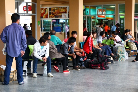 Passenger waiting for bus , chiangmai bus stationのeditorial素材