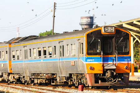 CHIANGMAI    THAILAND - FEBRUARY  5 2014  THN Diesel railcar no 1122 and train no 407 at chiangmai...