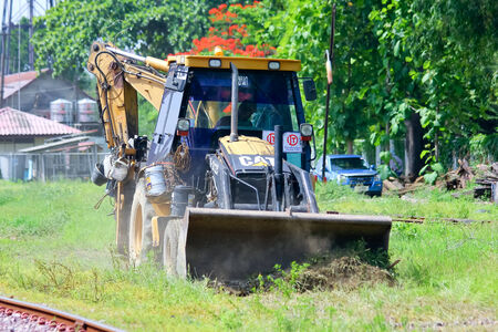  CHIANGMAI, THAILAND - JULY 4  2014   Private Tractor work at Chiangmai railway Station  Photo at Chiangmai railway Station  のeditorial素材