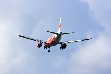 CHIANGMAI , THAILAND - SEPTEMBER 8 2014: HS-ABY Airbus A320-200 of Thaiairasia. landing to Chiangmai airport from Phuket.のeditorial素材