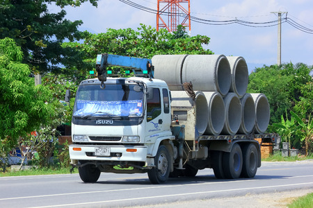 CHIANGMAI , THAILAND - OCTOBER  3 2014: Truck for Concrete Pipe of Piboon Concrete. Photo at road no.121 about 8 km from downtown Chiangmai, thailand.のeditorial素材