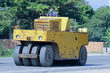 CHIANGMAI, THAILAND -NOVEMBER 1 2014: An unidentified Sakao Tire roller. Sakai is Heavy Industries of Japan. Photo at road no.121 about 8 km from downtown Chiangmai, thailand.のeditorial素材