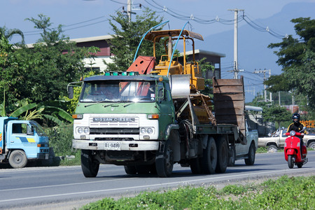 CHIANGMAI, THAILAND-NOVEMBER 17 2014:  Private Old Truck and Tractor. Photo at road no.121 about 8 km from downtown Chiangmai, thailand.のeditorial素材