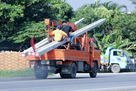 CHIANGMAI, THAILAND - NOVEMBER 20 2014: Private Truck with crane. Photo at road no.121 about 8 km from downtown Chiangmai, thailand.のeditorial素材