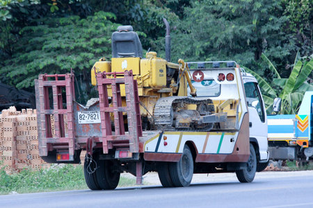 CHIANGMAI , THAILAND - DECEMBER  9  2014:  Private truck and Tractor. Photo at road no.121 about 8 km from downtown Chiangmai, thailand.のeditorial素材